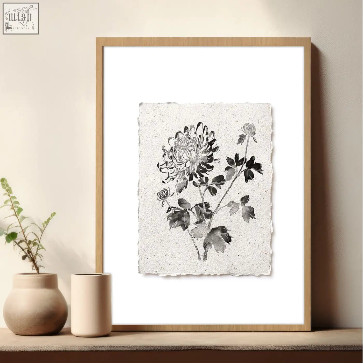A framed french country botanical floral print of a chrysanthemum in beige and grey on textured paper