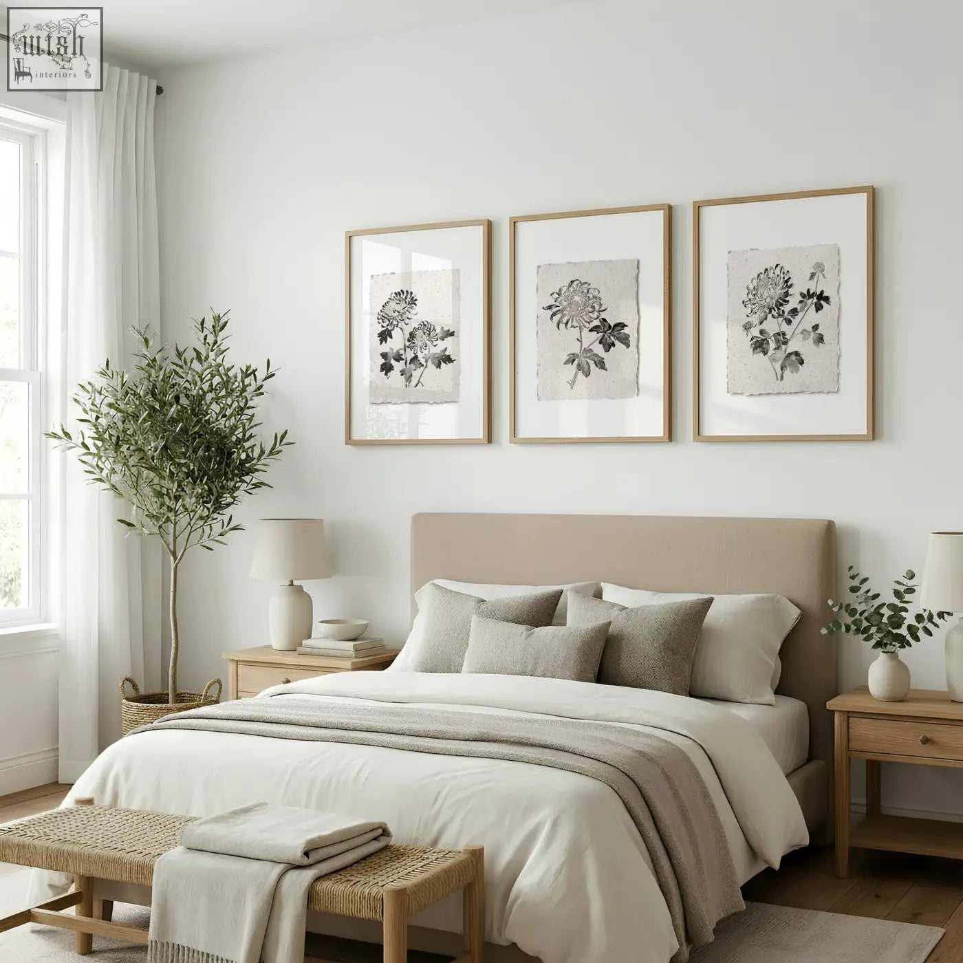 Beige upholstered bed with matching pillows and neutral throw next to french country botanical floral print wall art set