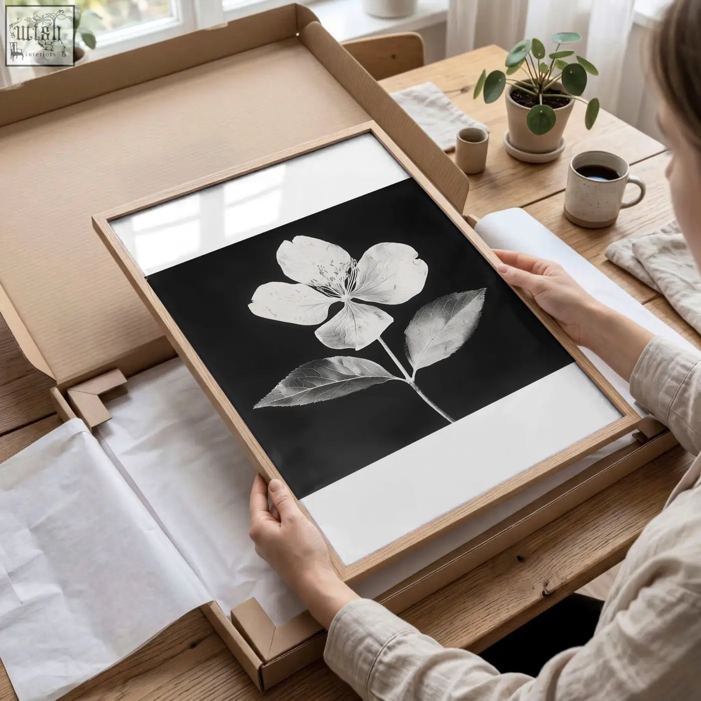 Minimalist black and white floral wall art set of 3 with delicate botanical prints in light wood frames for wall decor