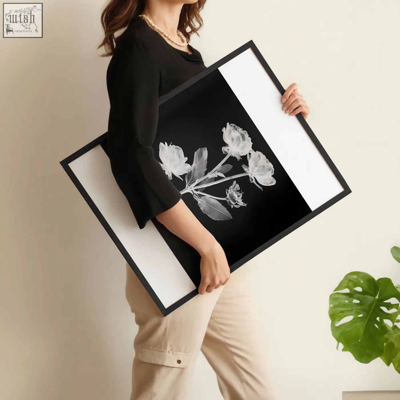 Black-framed floral wall art featuring white botanical prints on black background with wide white vertical borders set of 3