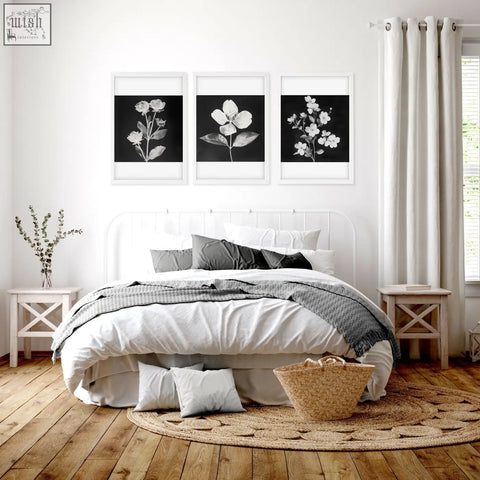 Woven wicker basket with natural tan hue and sturdy texture paired with charcoal and white floral wall art set of 3