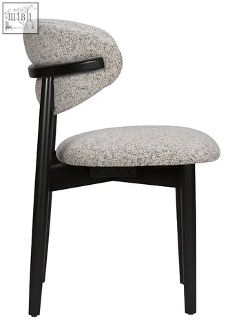 Florence dining chair with sleek black frame and textured gray fabric seat made from solid beech wood