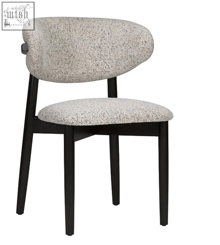Florence dining chair with speckled gray upholstered seat and backrest on sleek solid beech wood legs