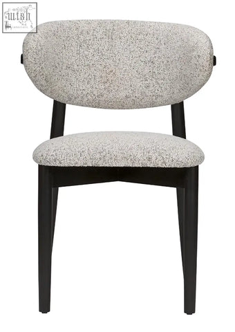 Florence dining chair with speckled gray upholstered seat and backrest on sleek solid beech wood legs