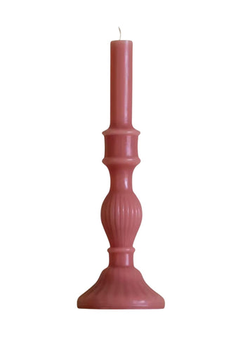 A tall slender pink florence pillar candle with ribbed design and smooth wax surface in rose set of 2