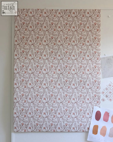 A rectangular sample of florence wallpaper shell with a small repeat coral-like pattern in muted rose and gray tones