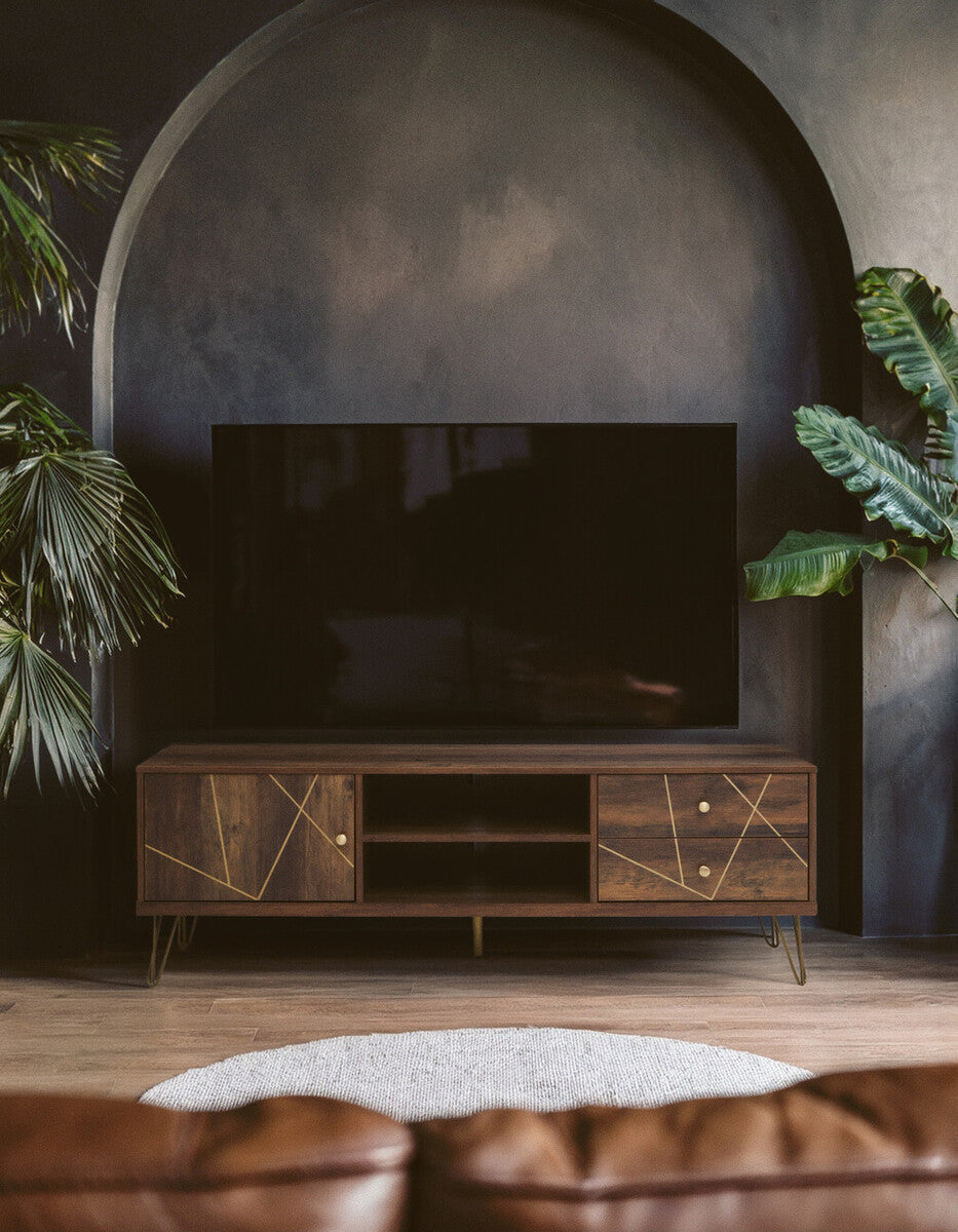 Dark wood flori media unit with geometric gold inlay patterns and slim metal legs perfect for stylish storage