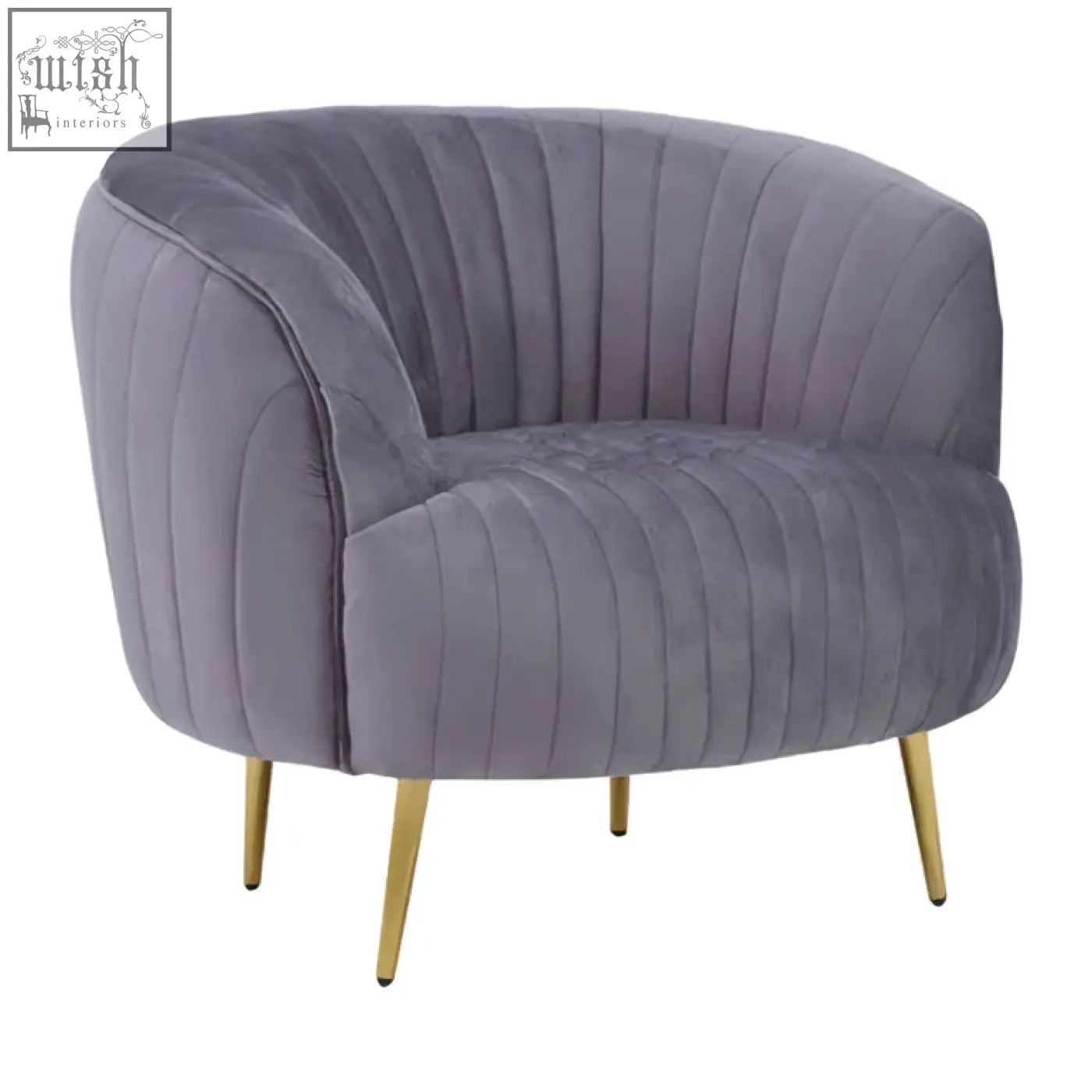 A plush florina grey velvet chair with vertical pleats and slender gold legs perfect for cozy seating