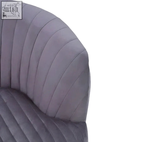 Florina grey velvet chair with gold legs featuring a curved tufted backrest and matching quilted seat in grey velvet