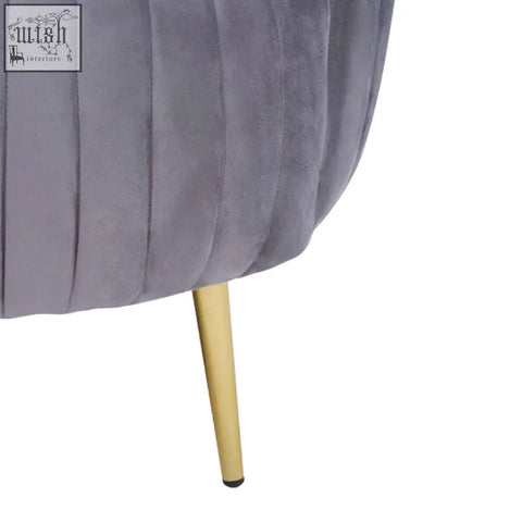 Florina grey velvet chair with gold legs featuring cozy grey velvet upholstery and stylish gold-tone legs