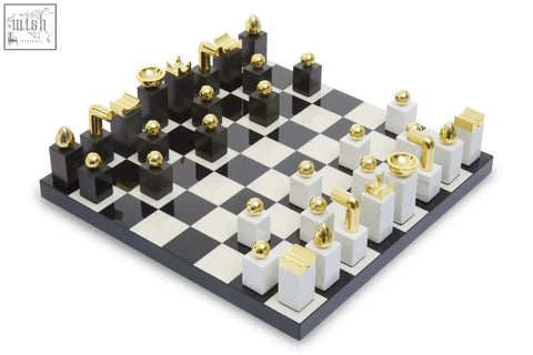 Flos marble and wood chess set with black and white checkered board and gold accented wood chess pieces on glossy surface