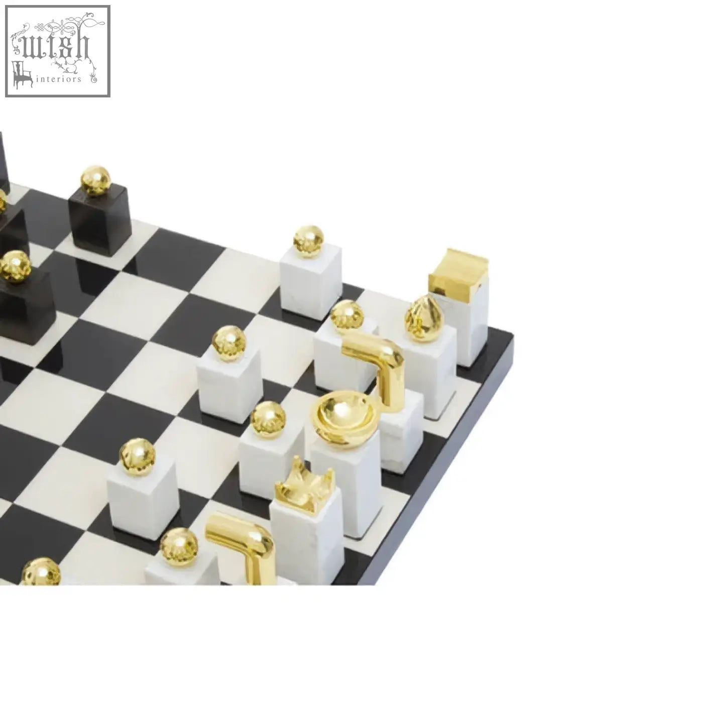 A sleek black and white wood chess set with gold accents on a glossy flos marble checkered board
