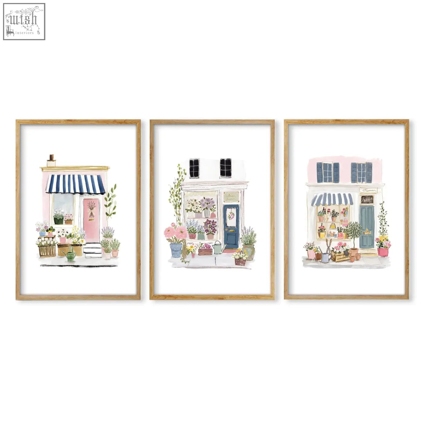 Set of 3 framed flower art prints featuring pastel flower shop facades with striped awnings and potted plants