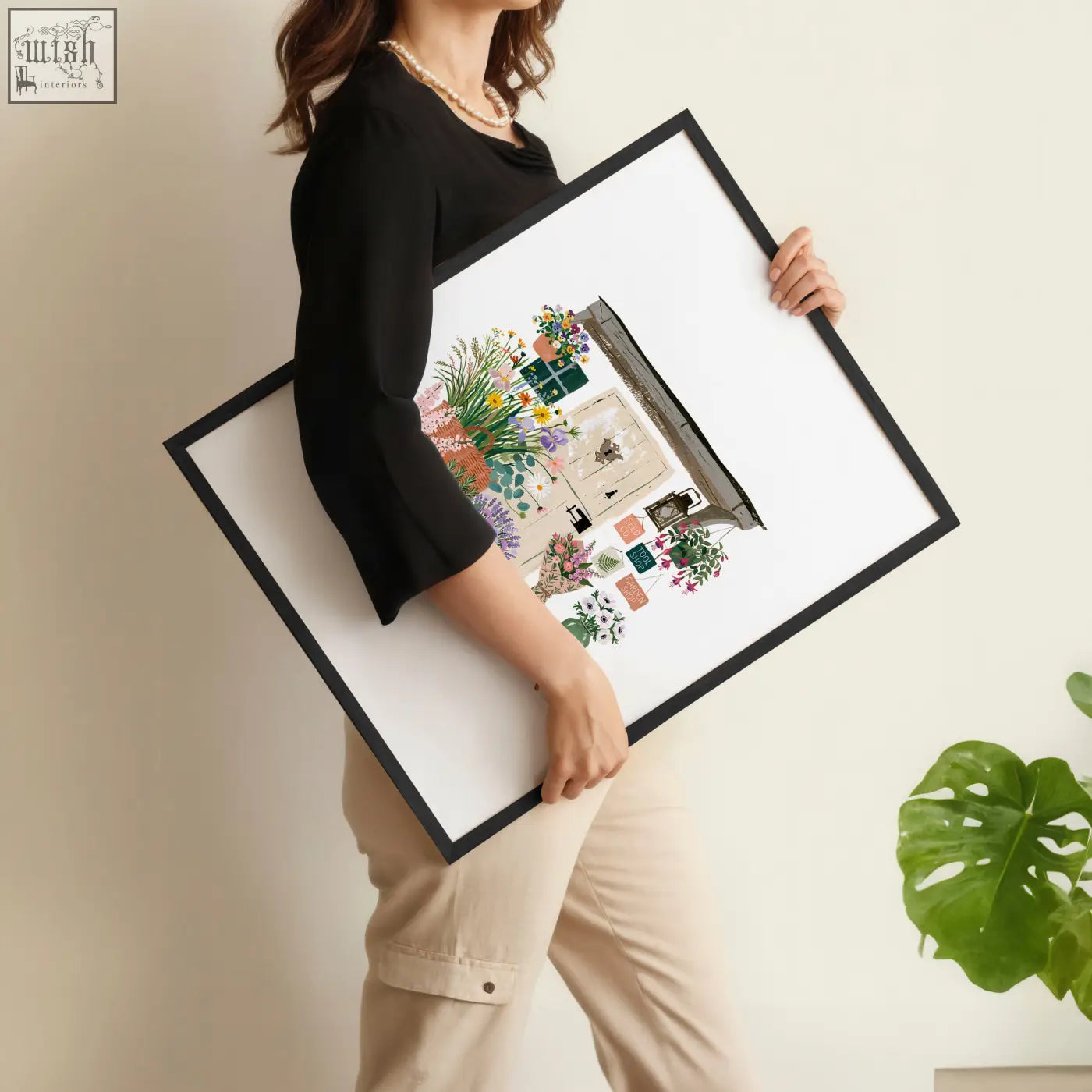 Black-framed flower print wall art set featuring colorful indoor garden illustrations for flower shop decor