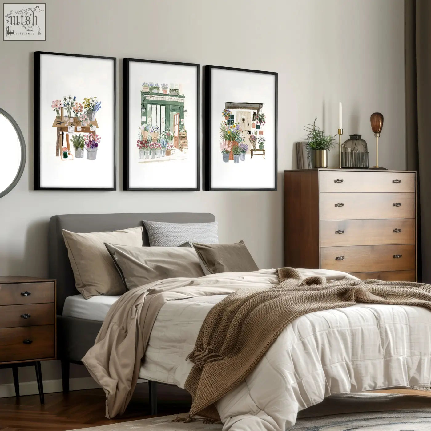 Three framed flower print wall art featuring watercolor flower shop scenes in black frames above the bed
