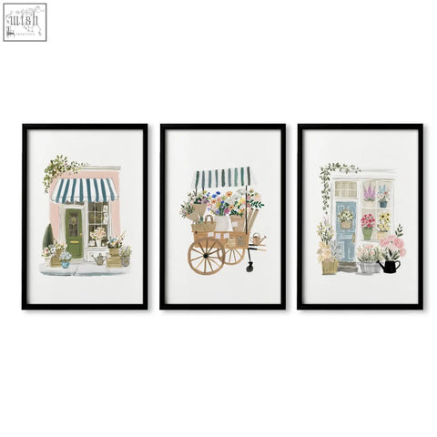 Set of three black framed flower prints with watercolor floral designs perfect for country cottage or flower shop decor