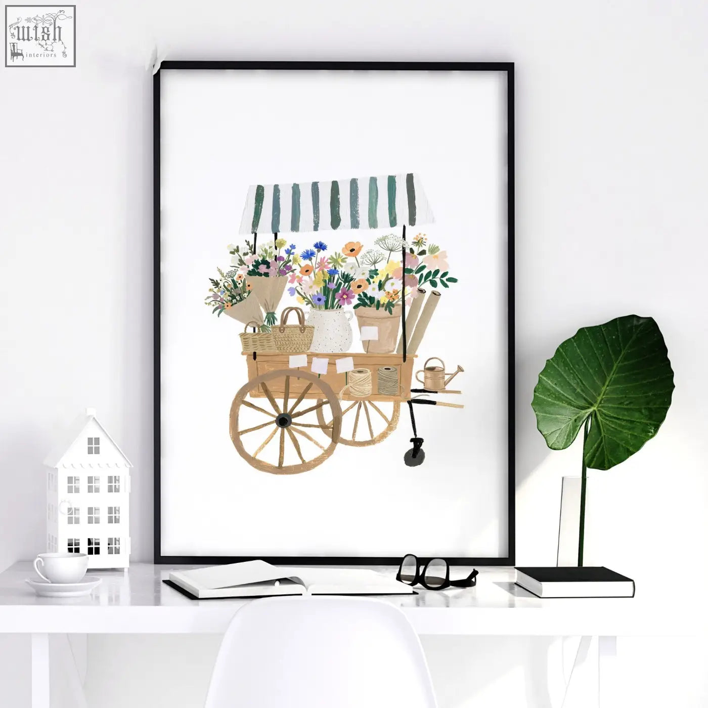 A framed flowers artwork print of a flower shop cart with wooden wheels and colorful blooms in woven baskets