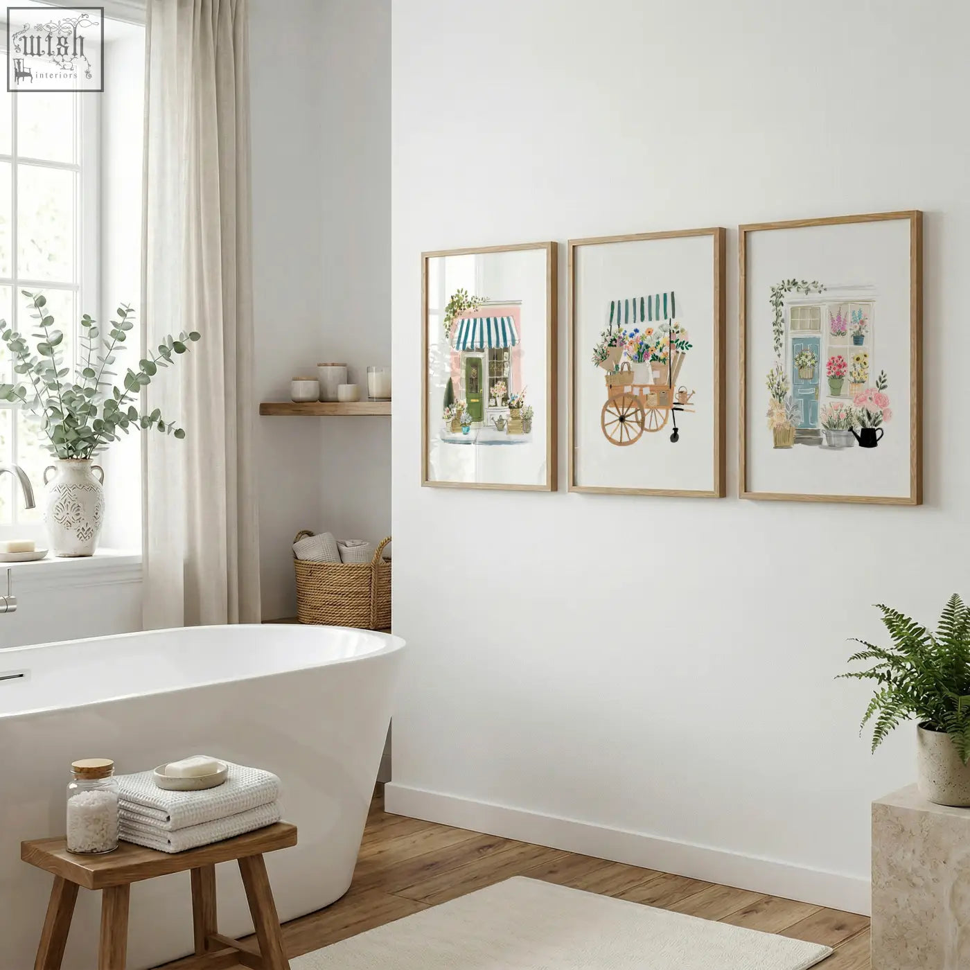 Three framed botanical flower shop art prints with light wood frames hang on a white wall perfect for flowers artwork