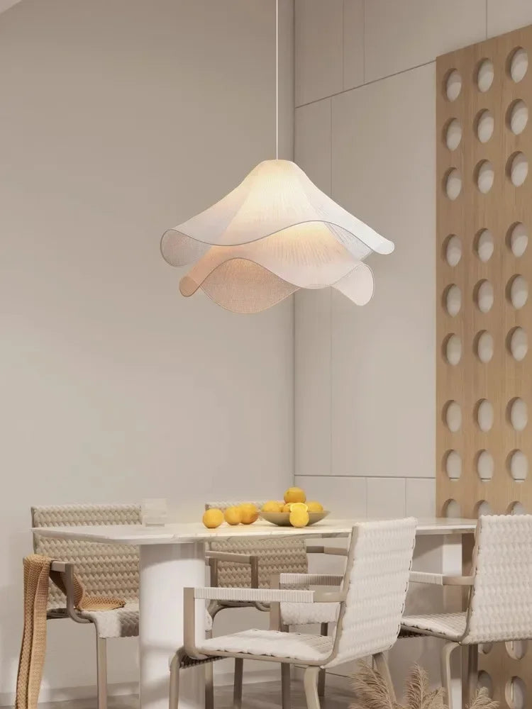 A soft off-white flowers cloth chandelier pendant light with layered petal design for home decoration