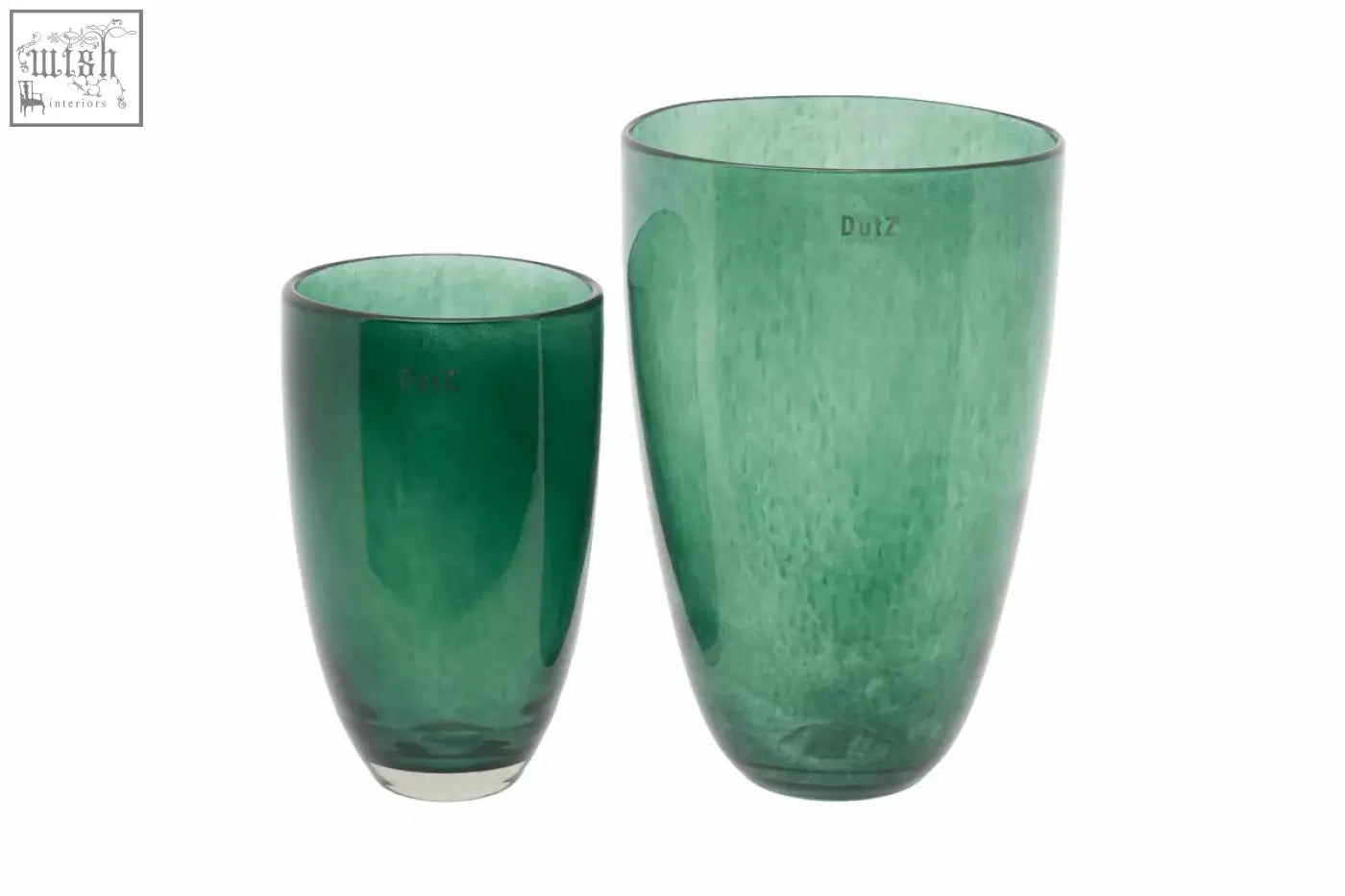 Two mouth blown emerald green dutz collection glass vases with bubbly textured surface and clear bases