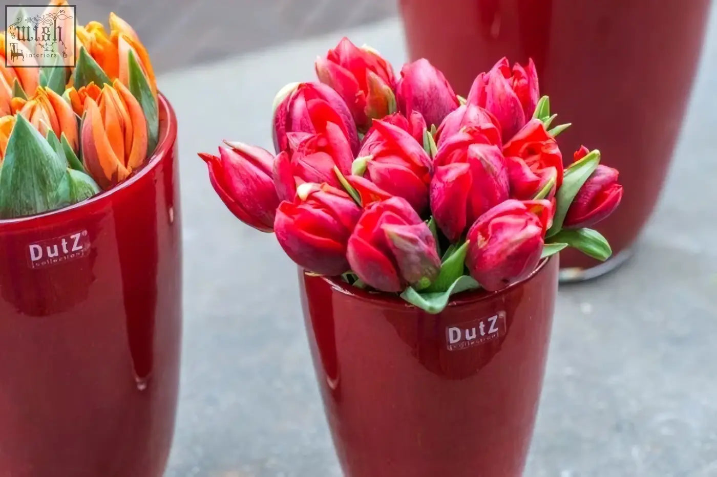 Red dutz collection flowervase with vibrant tulips in mouth blown glossy ceramic perfect for stylish decor