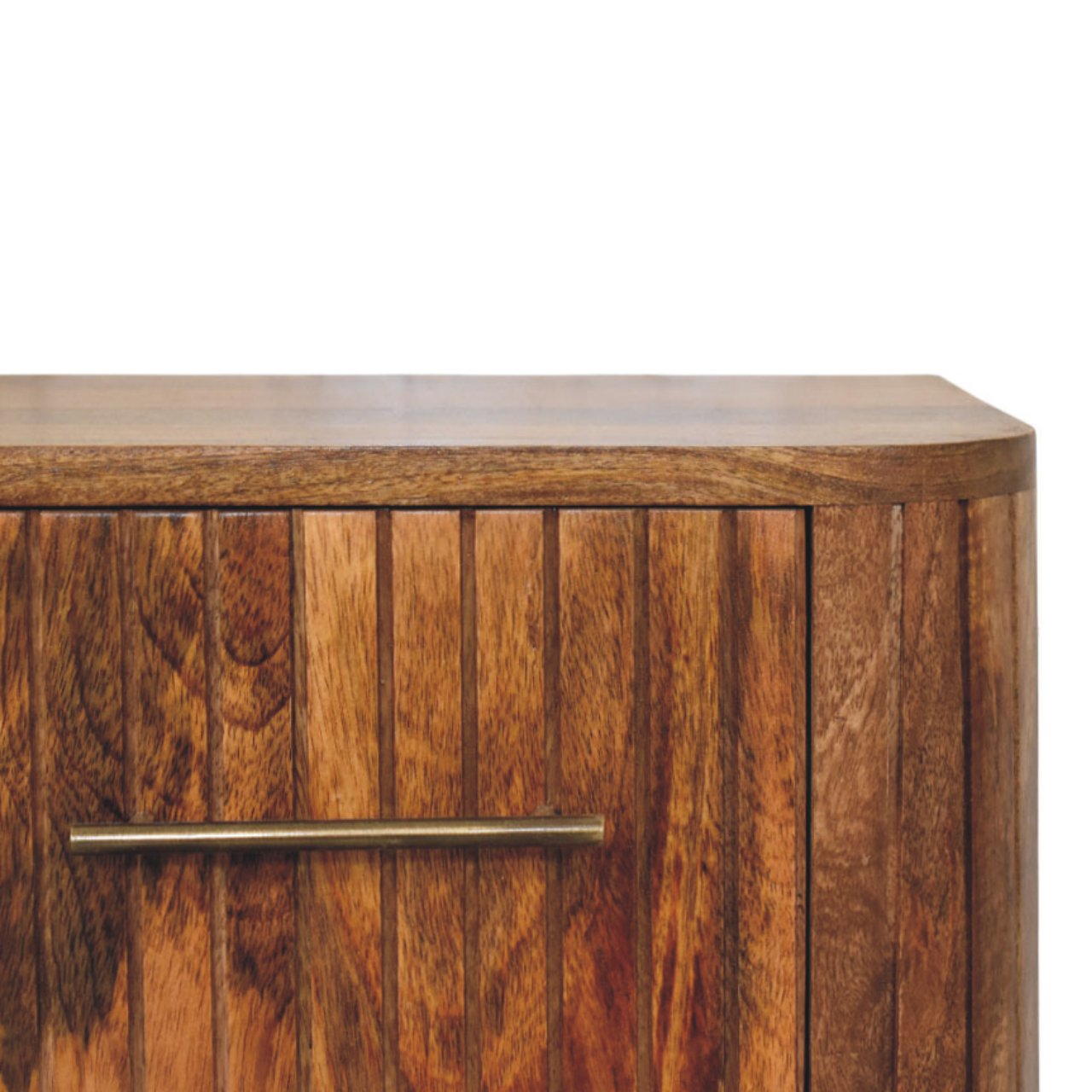 A rustic wooden fluted bedside table with vertical slats and a brass handle for bedroom storage
