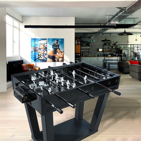 Black foosball table with white player figures and sleek modern design perfect for game rooms and offices