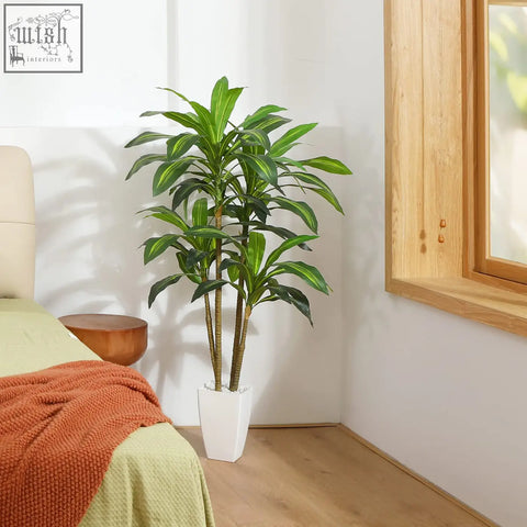 Tall artificial dracaena tree with 74 vibrant green leaves and brown stems in sleek white rectangular pot for indoor use
