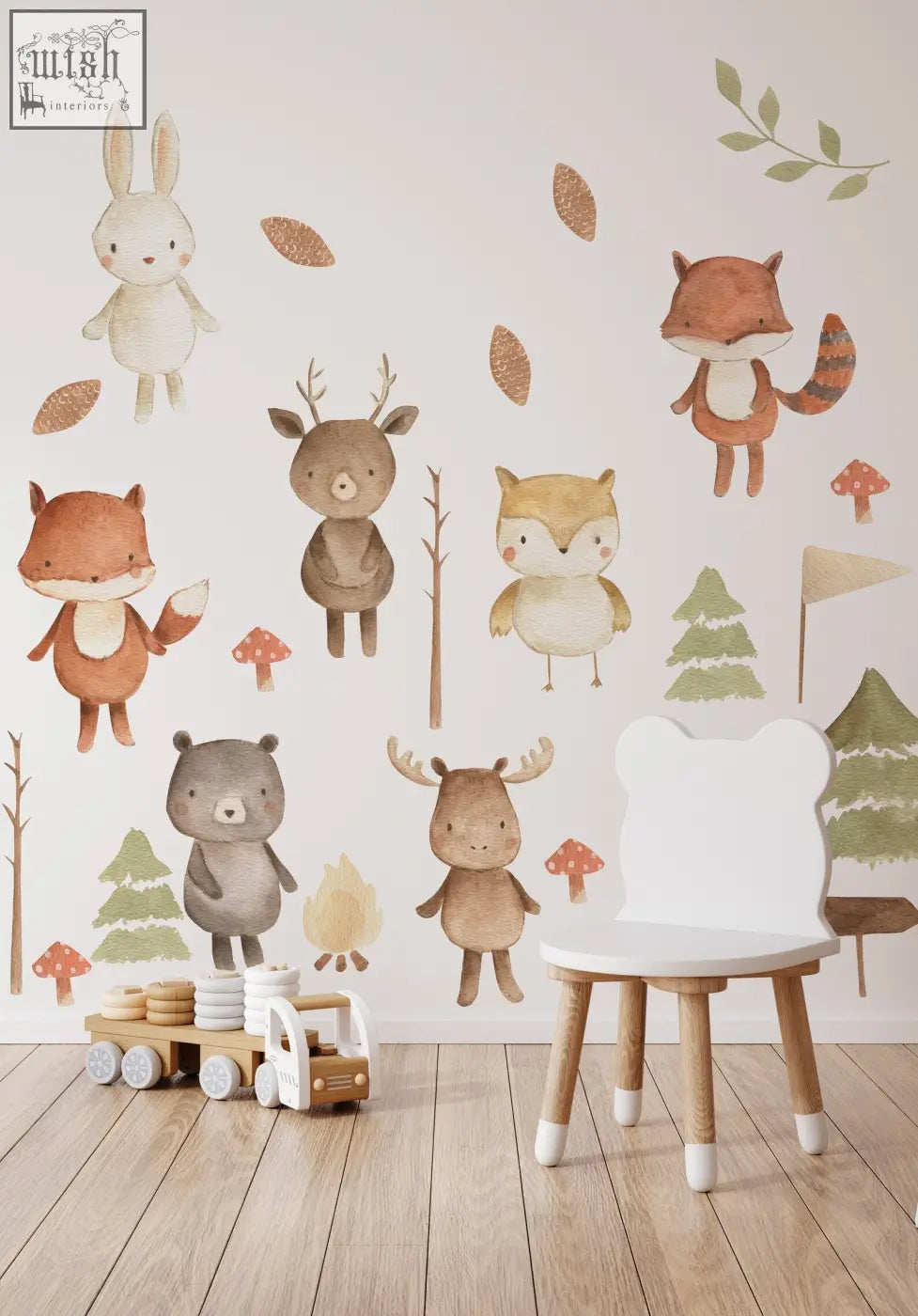 White bear-shaped chair with wooden legs and white foot caps in a forest animals nursery wall decal setting
