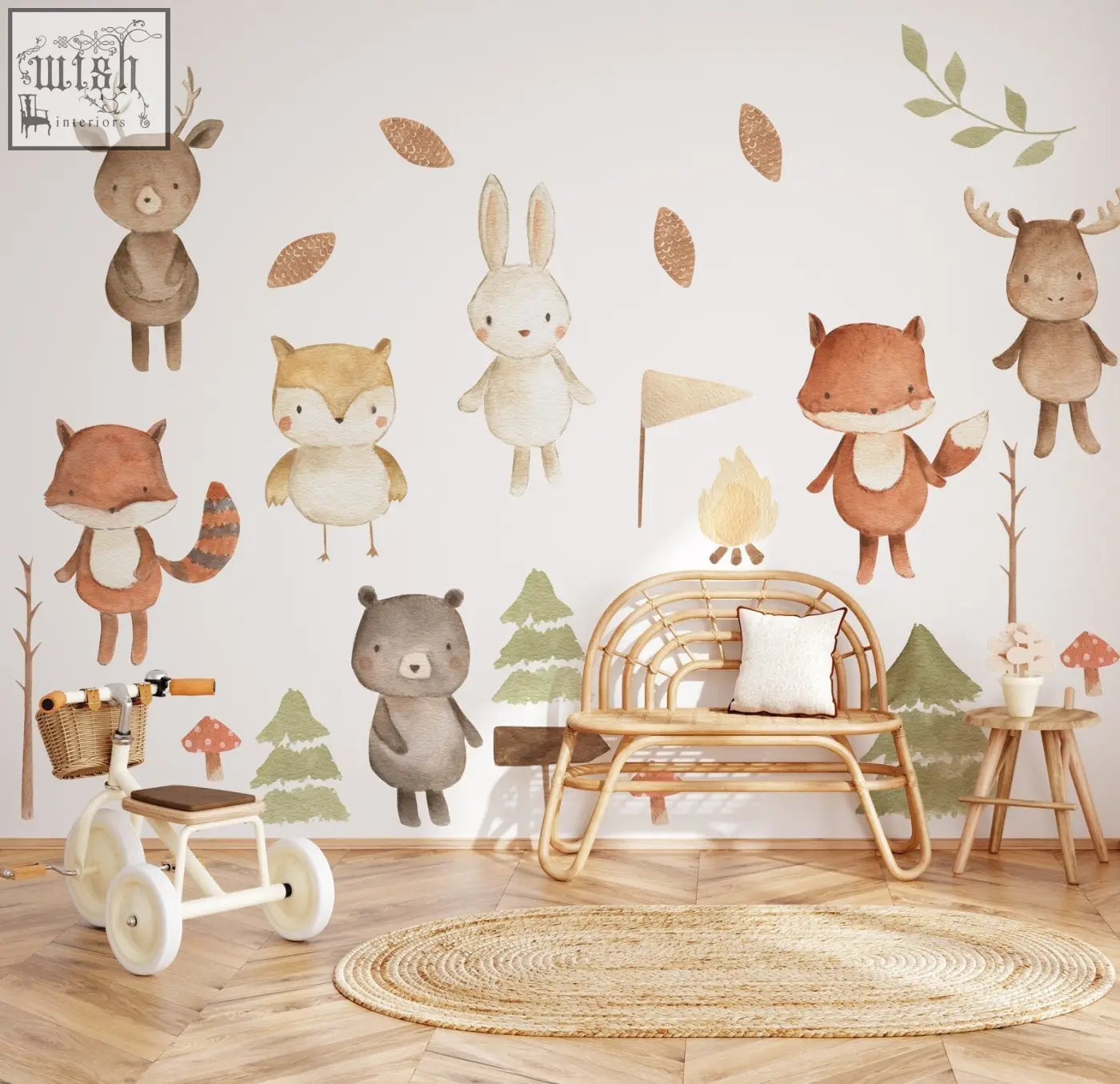 A charming white children’s tricycle with wooden handlebars and woven basket beside forest animals nursery wall decal