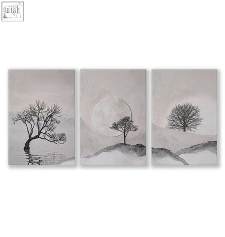 Set of 3 minimalist forest art prints showing solitary trees on muted gray and beige textured wall art landscapes
