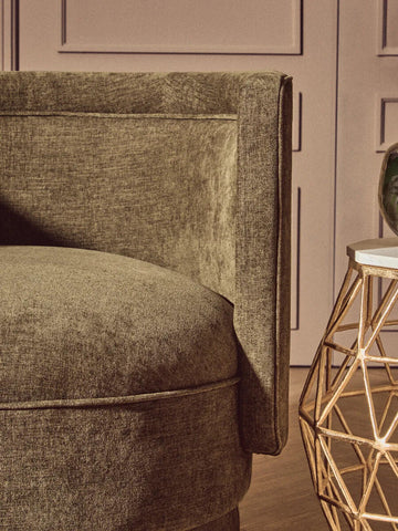 Forest green chenille effect accent chair with textured fabric and modern minimalist curved design by drake