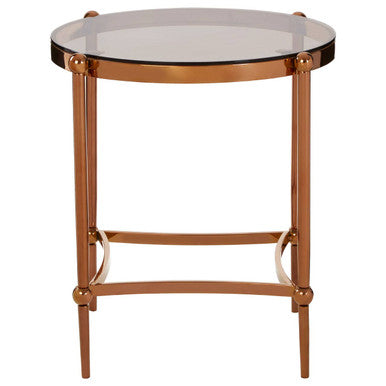 A sleek round forli rose gold side table with a clear glass top and polished brass frame perfect for any room