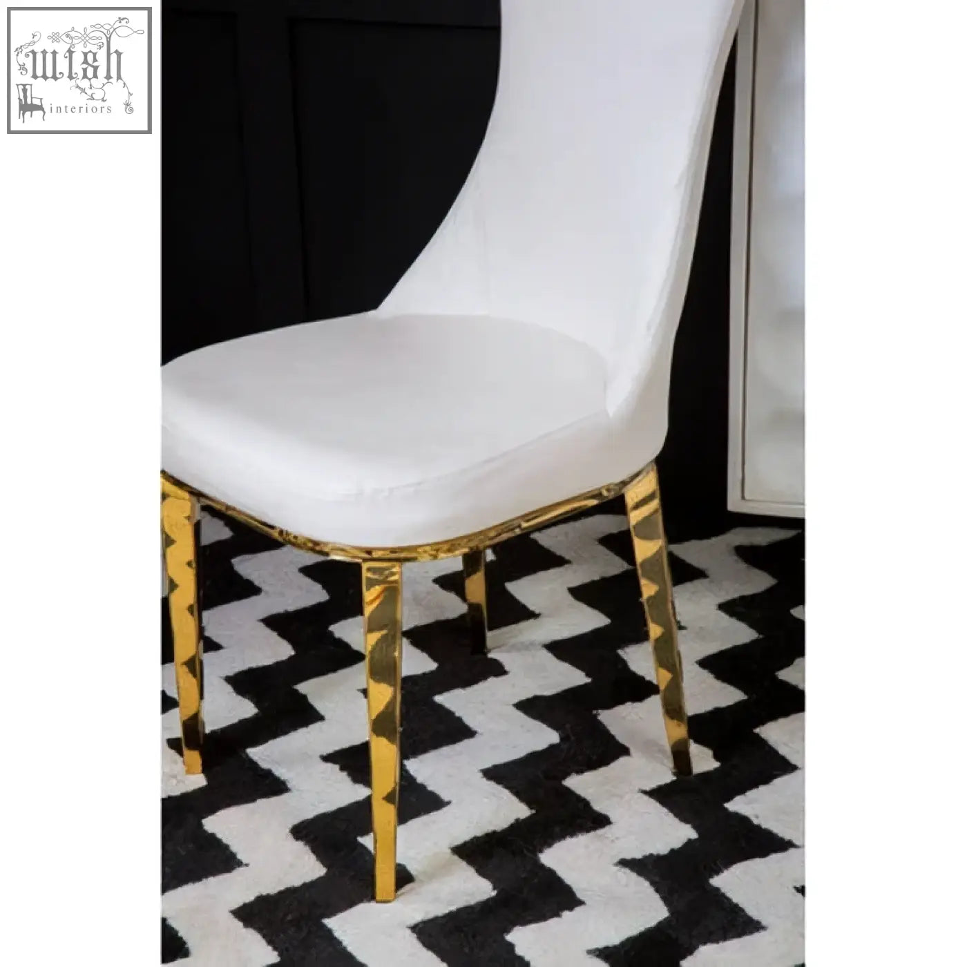 Forli white dining chair with white upholstered seat and gold finish stainless steel legs with geometric accents
