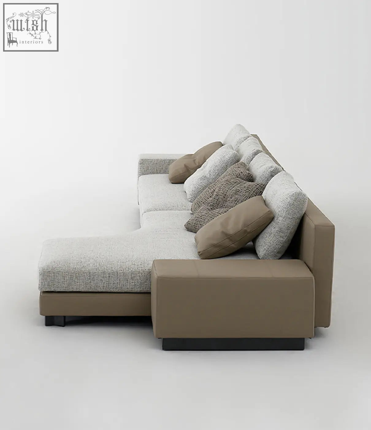 Modern l-shaped foster four seater corner sofa in light gray fabric and tan leather with matching throw pillows and low shipping cost