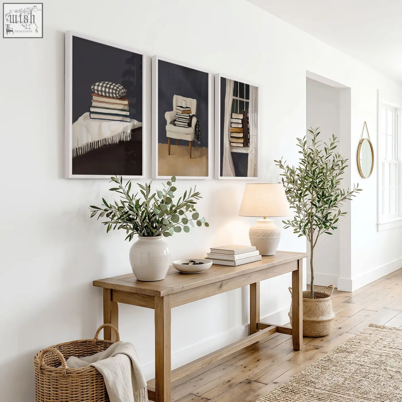 Light beige ceramic table lamp with soft linen shade perfect for a cozy reading nook with framed 3 piece wall art