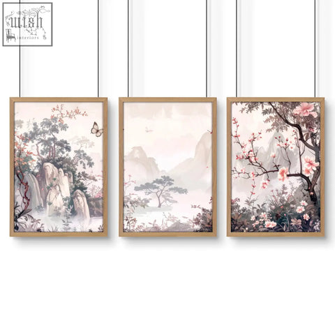 Set of three framed artworks featuring pastel chinoiserie wall art with delicate floral oriental landscape prints