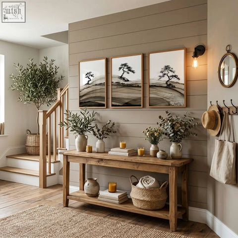 Rustic wooden console table with shelves holding decor beneath framed asian wall art japanese ink bonsai pine trees set of 3