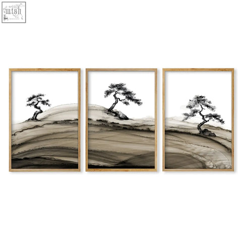 Set of three framed asian wall art featuring minimalist ink-wash bonsai pine trees on earth-toned hills