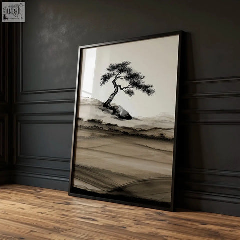 Black-framed minimalist asian wall art of solitary bonsai pine tree ink wash painting on rocky terrain
