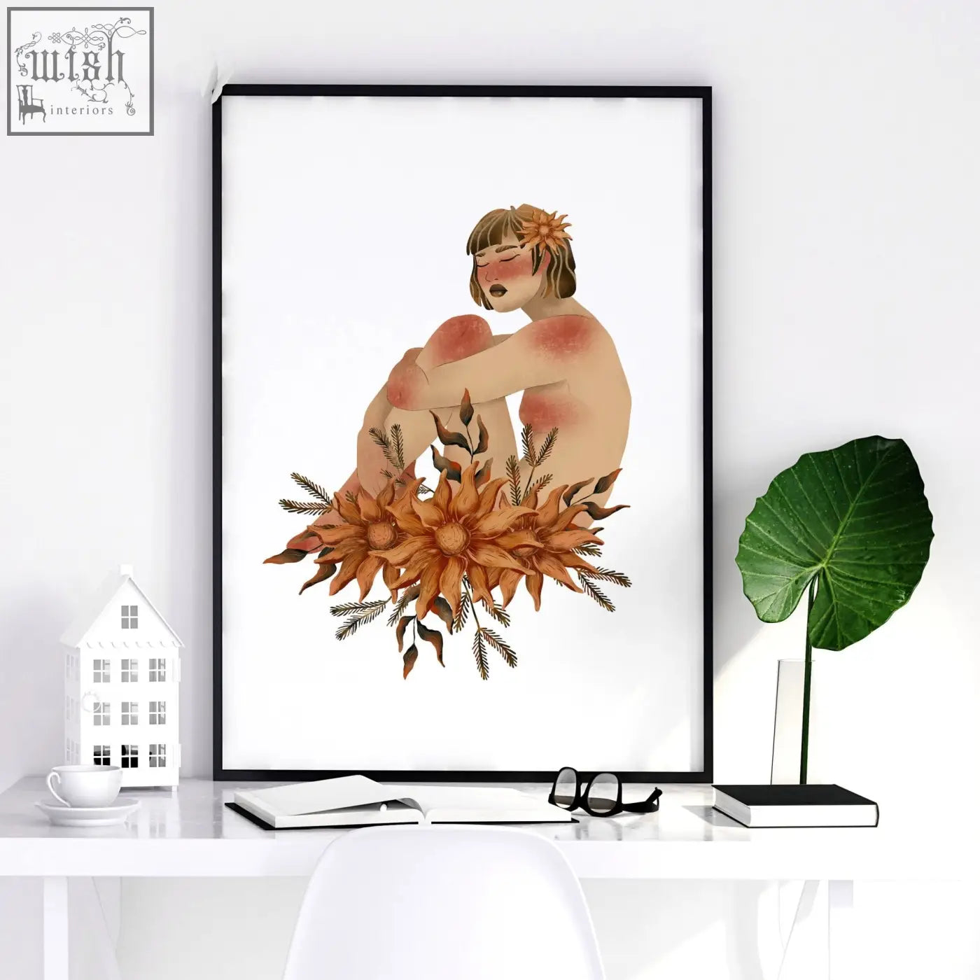 A framed watercolor wall art print of a woman with orange flowers perfect for bathroom wall art prints