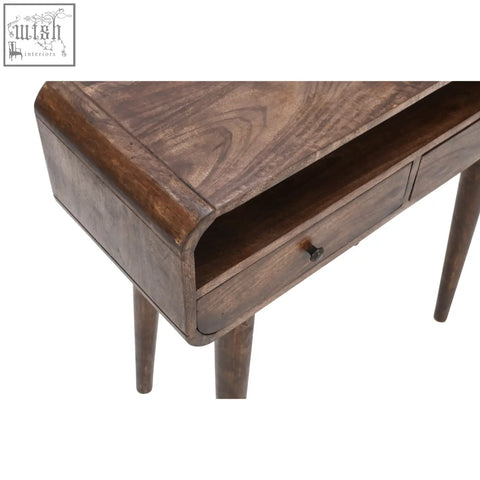 Dark brown franklin dark mango wood console table with tapered legs and a single drawer for stylish storage