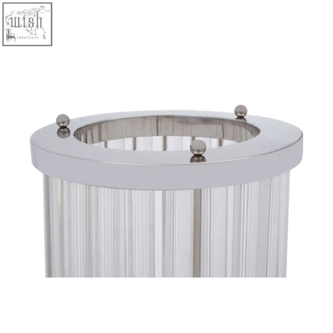 Small silver franklin glass candle holder with chrome finish and vertical ribs topped with three spherical caps
