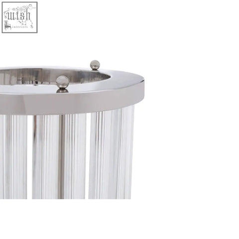 A sleek small silver and glass candle holder with a polished chrome rim and clear glass prisms hanging vertically