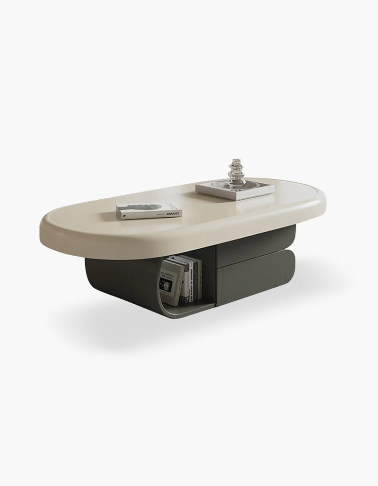 Modern oval freda coffee table with smooth milky white top and dark gray base featuring storage compartments
