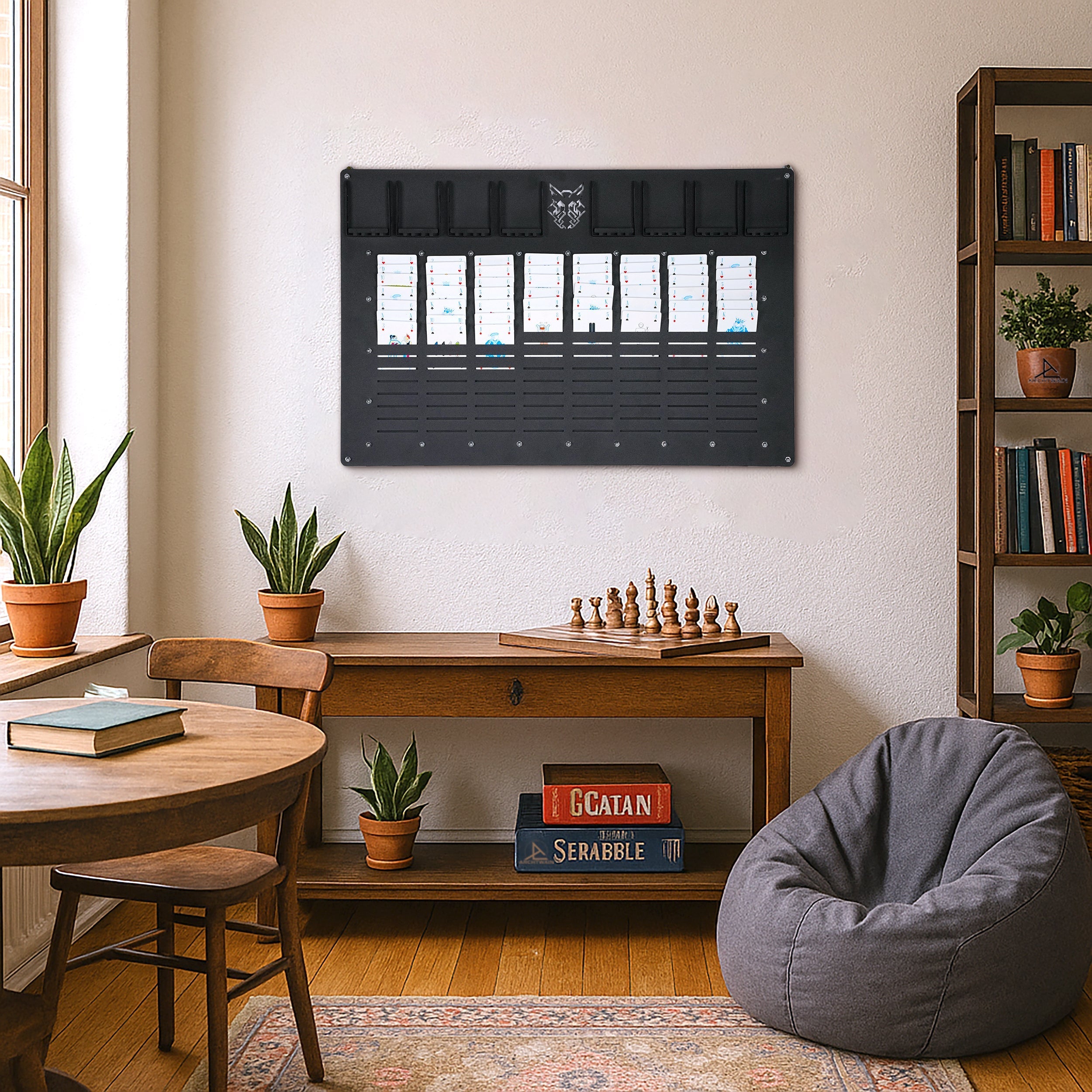 Black metal wall mounted freecell wall game organizer with six vertical slots and central wolf emblem