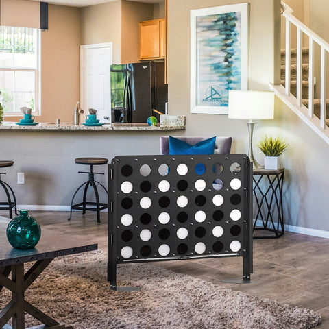 Freestanding four in a row game board in black metal with white and blue discs life size four game board fun play