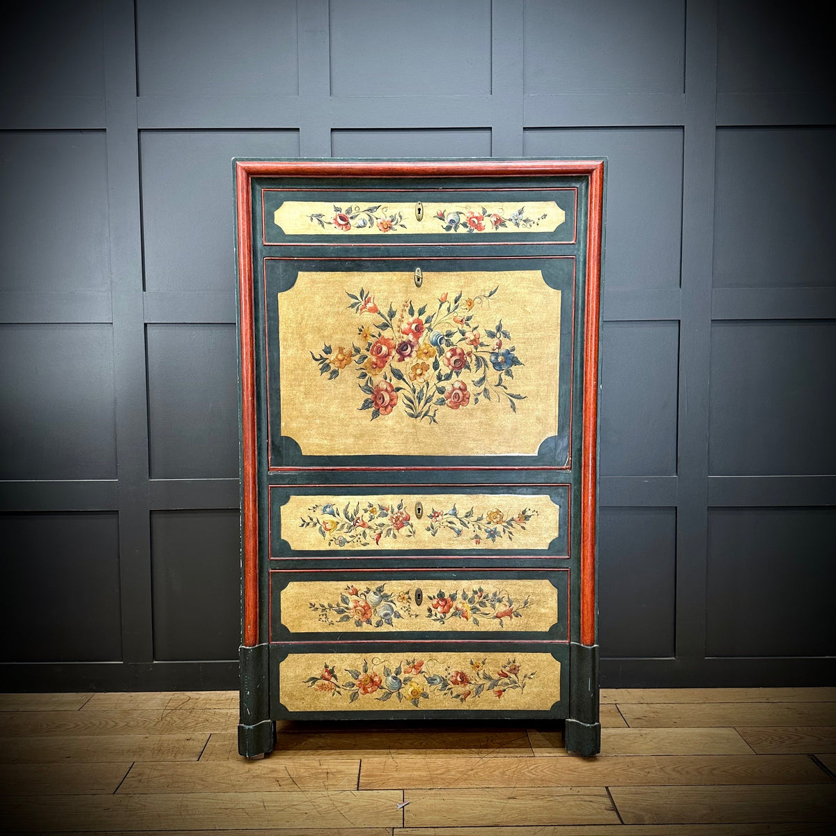 Antique-style wooden French painted drop front bureau desk secretaire d’abattant with black red frame and gold leaf floral panels