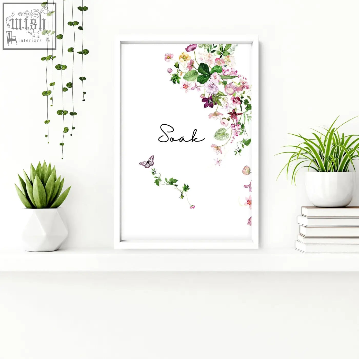White framed wall art with black cursive soak and watercolor blossoms perfect for french style country bathrooms