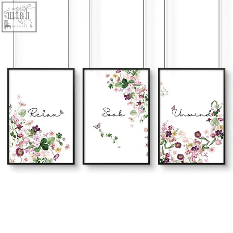 Set of 3 black-framed french style country wall art prints with pink and purple floral illustrations and relaxing script words